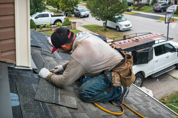 Professional Roofing technician working in Hustle, VA